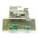 Cochesdemetal.es 1972 Nissan Patrol + Remolque 1/4 Tonelada "Hitch & Tow Series 25" Verde 1:64 Greenlight 32250a